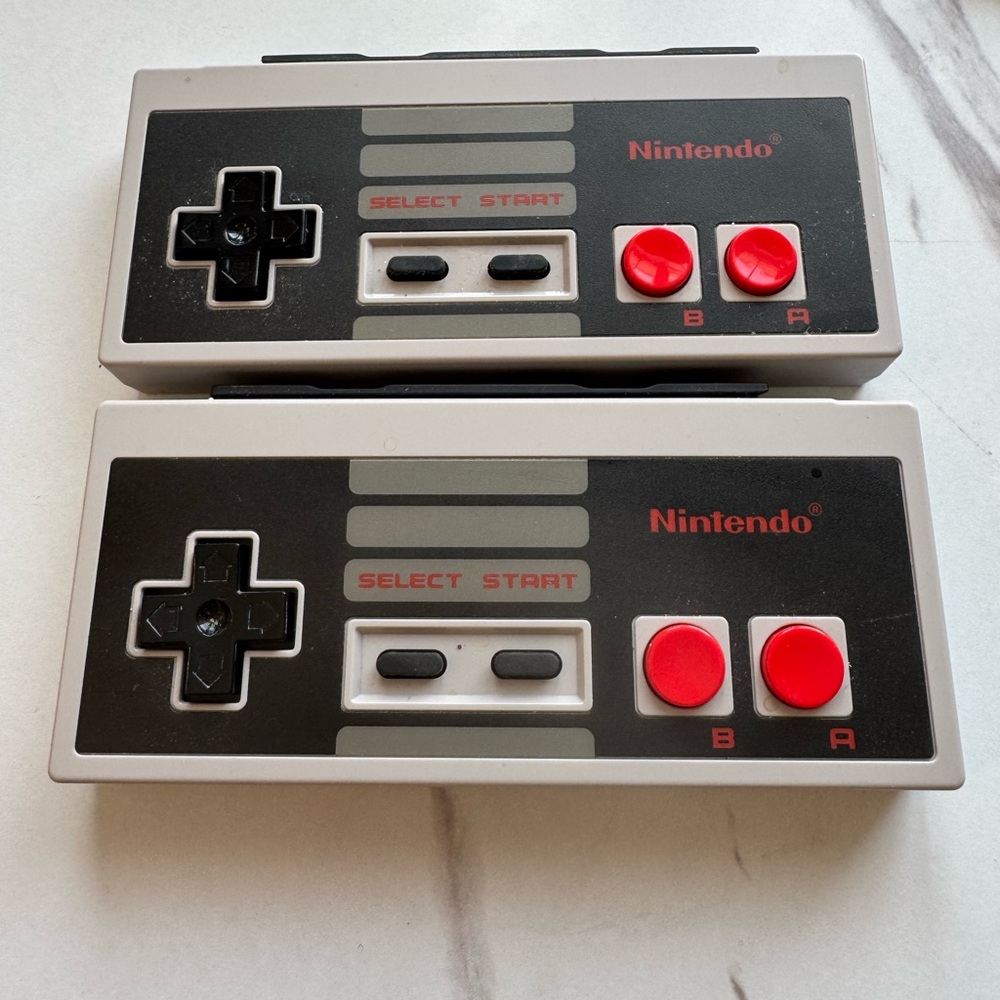 Nintendo Classic Gray and Black Controllers